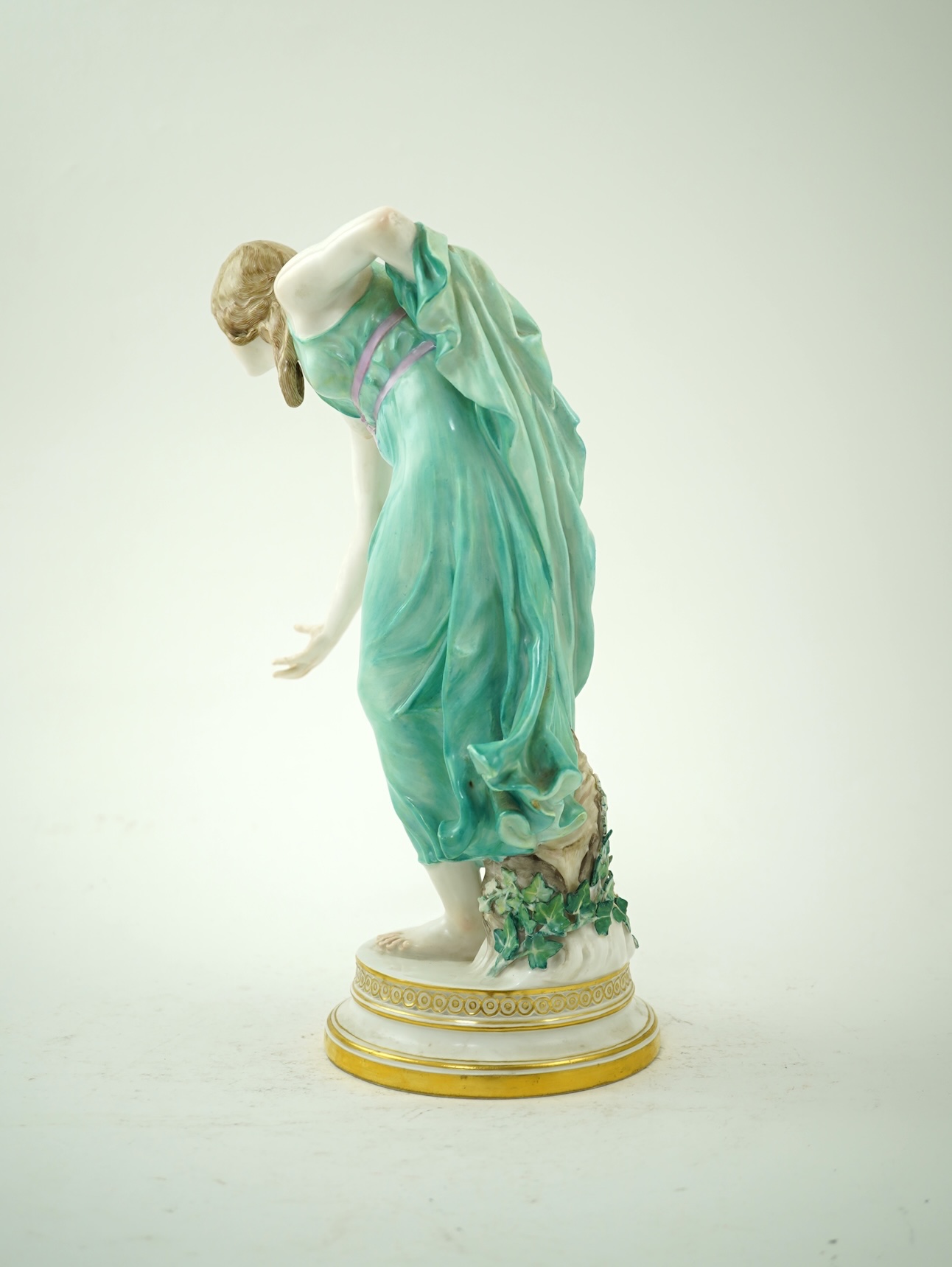 A Meissen porcelain figure, known as the 'Kugelspielerin', circa 1905, modelled by Walter Schott